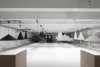 Complete W221 pendant installation showing multiple cone sizes and dramatic spatial lighting effects
