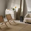 &tradition X lounge chair by Hvidt & Mølgaard featuring laminated oak frame and natural rattan seat