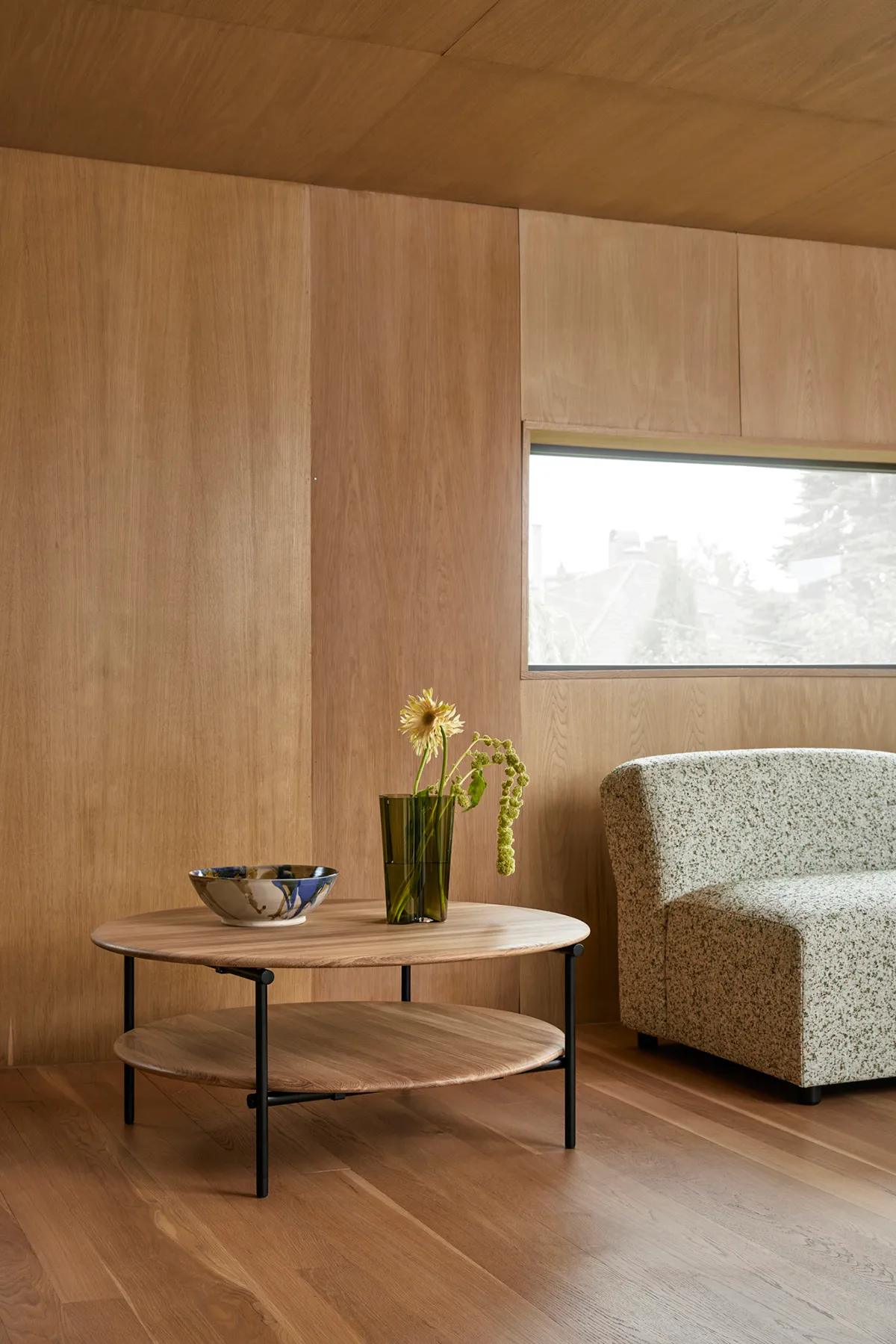 Mio occasional table by Takagi Homstvedt featuring circular oak top and lapped steel framework design