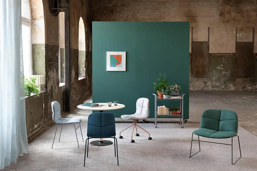 Neo Lite Soft easy chair by Fredrik Mattson for Materia showcasing quilted upholstery design