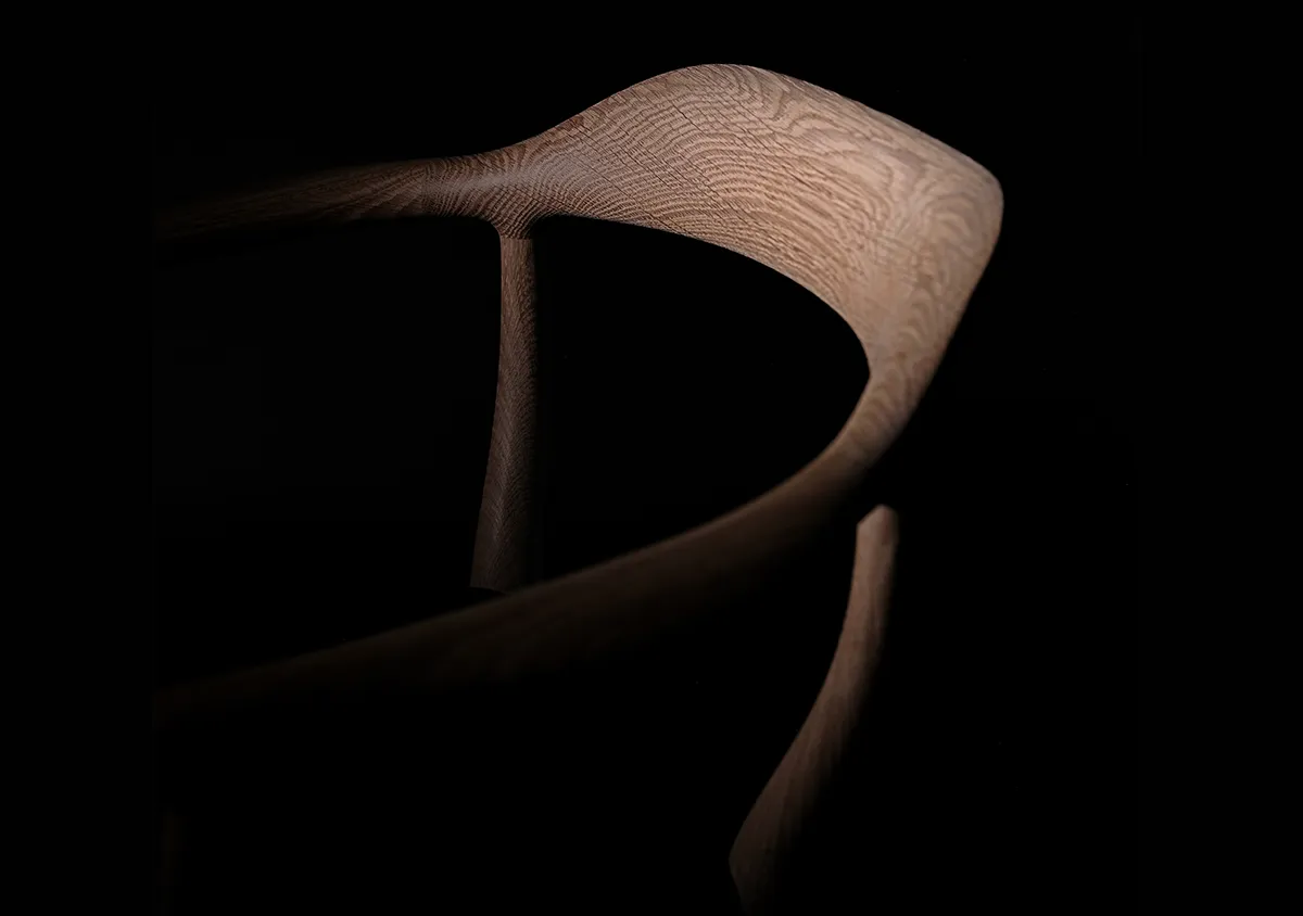 Bone Chair 44 by Finn Juhl showing organic sculptural form and floating seat construction