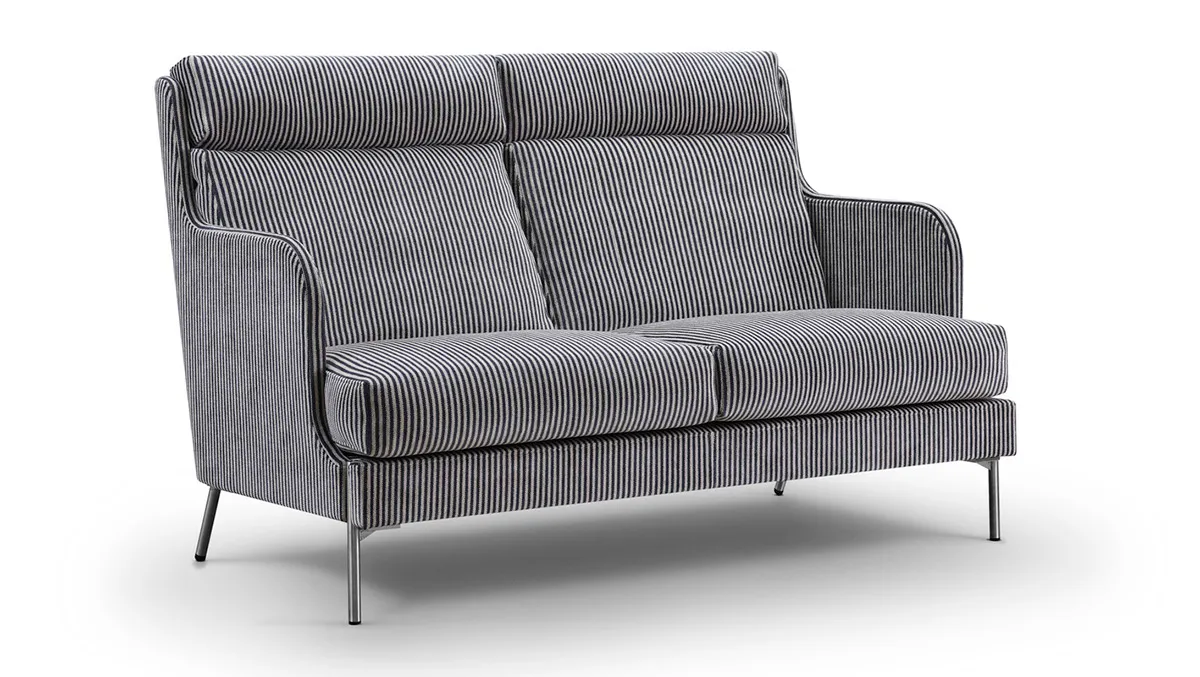 Funen sofa featuring streamlined profile and curved armrests designed by Pierre Sindre for Eilersen upholstery brand