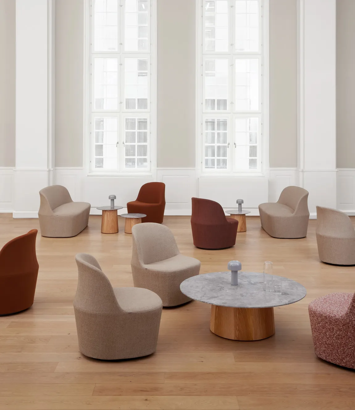 Gomo lounge collection featuring clean horizontal lines and generous upholstery designed by Hugo Passos for Fredericia