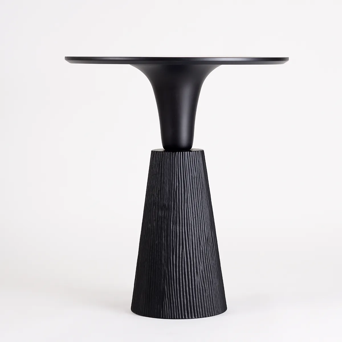 Pointe dining table featuring ballet-inspired tapered legs designed by Monica Förster for Zanat craftsmanship brand