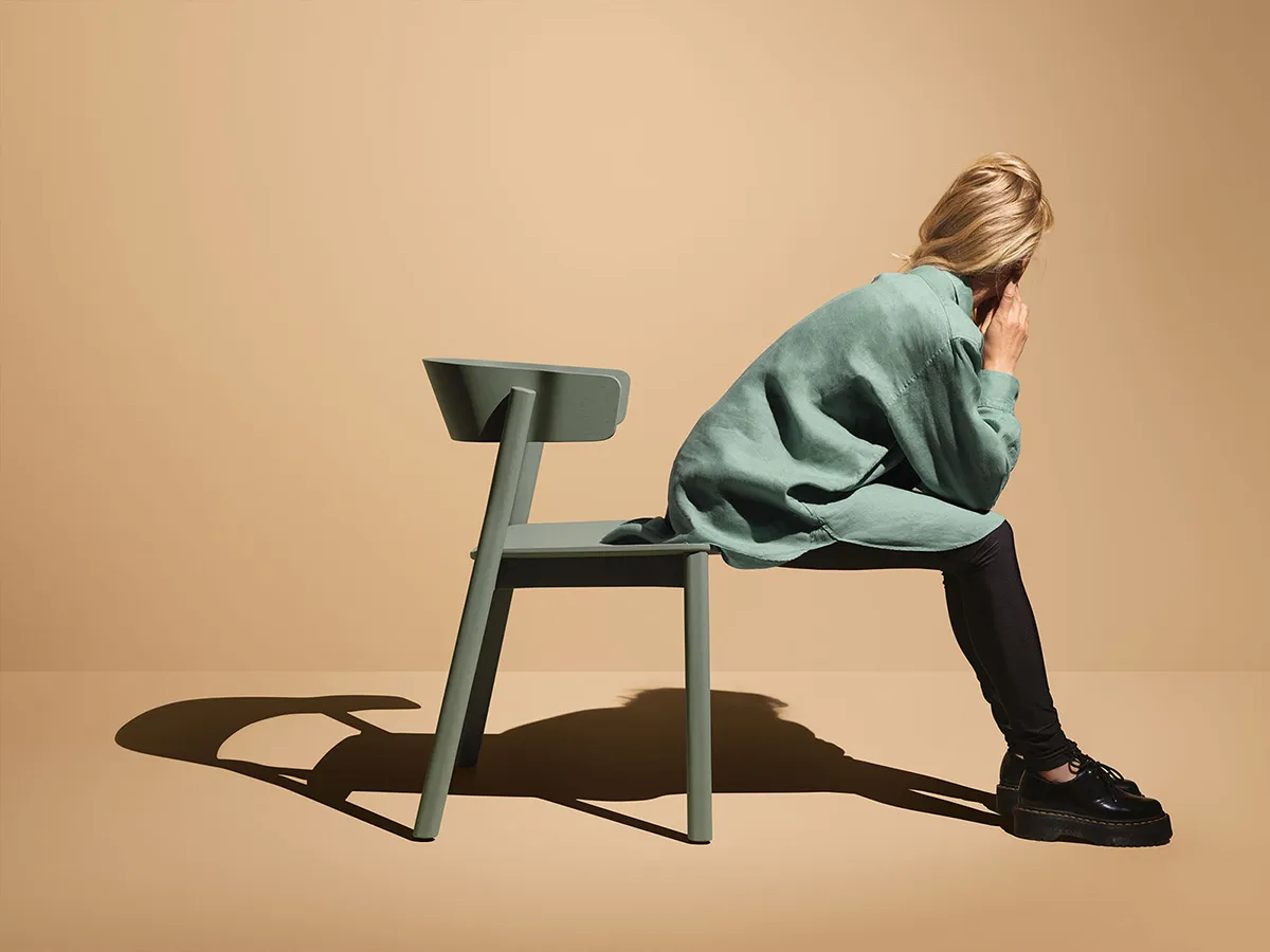 Wooden Embrace collection featuring bent wood armchair and matching table designed by Sami Kallio for Mizetto