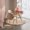 Anniversary edition of Nanna Ditzel's Arkade Chair by Brdr. Krüger featuring characteristic curved backrest