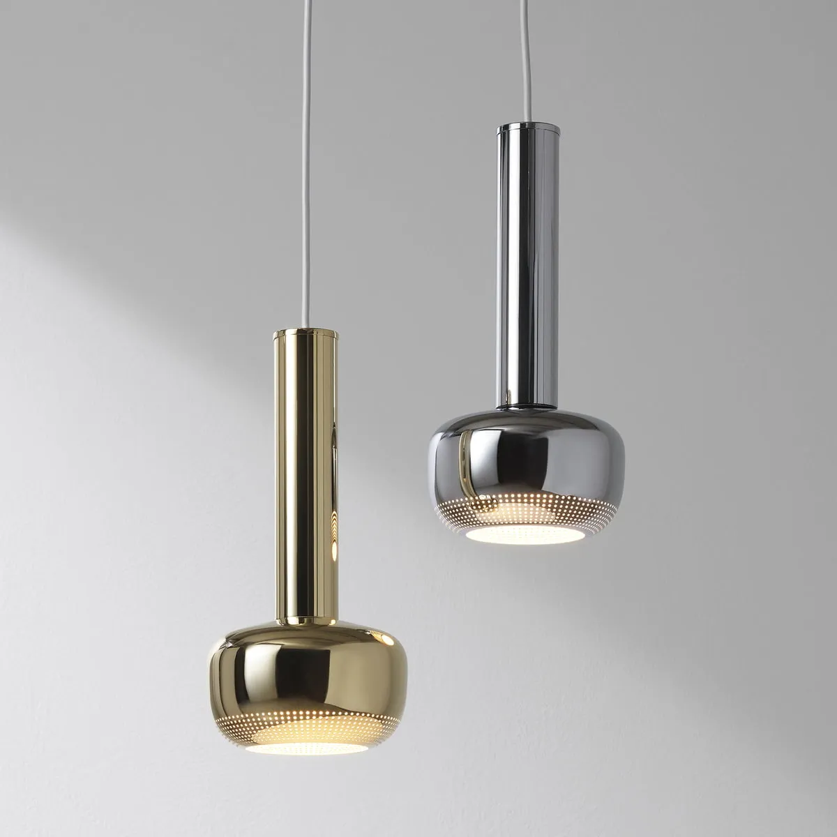 Reintroduced pendant lamps by Danish architect Vilhelm Lauritzen featuring geometric forms and precise proportions