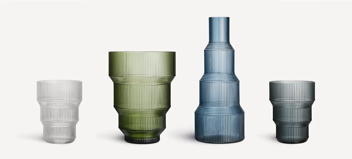 Complete Pavilion glass tableware collection by Front for Kosta Boda showing diverse functional items in the series