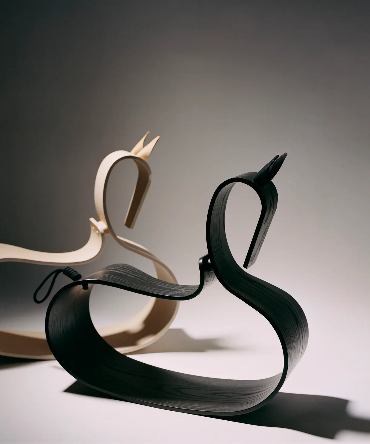 Fritz Hansen rocking horse with sculptural wooden form, showcasing Danish design heritage and craftsmanship.