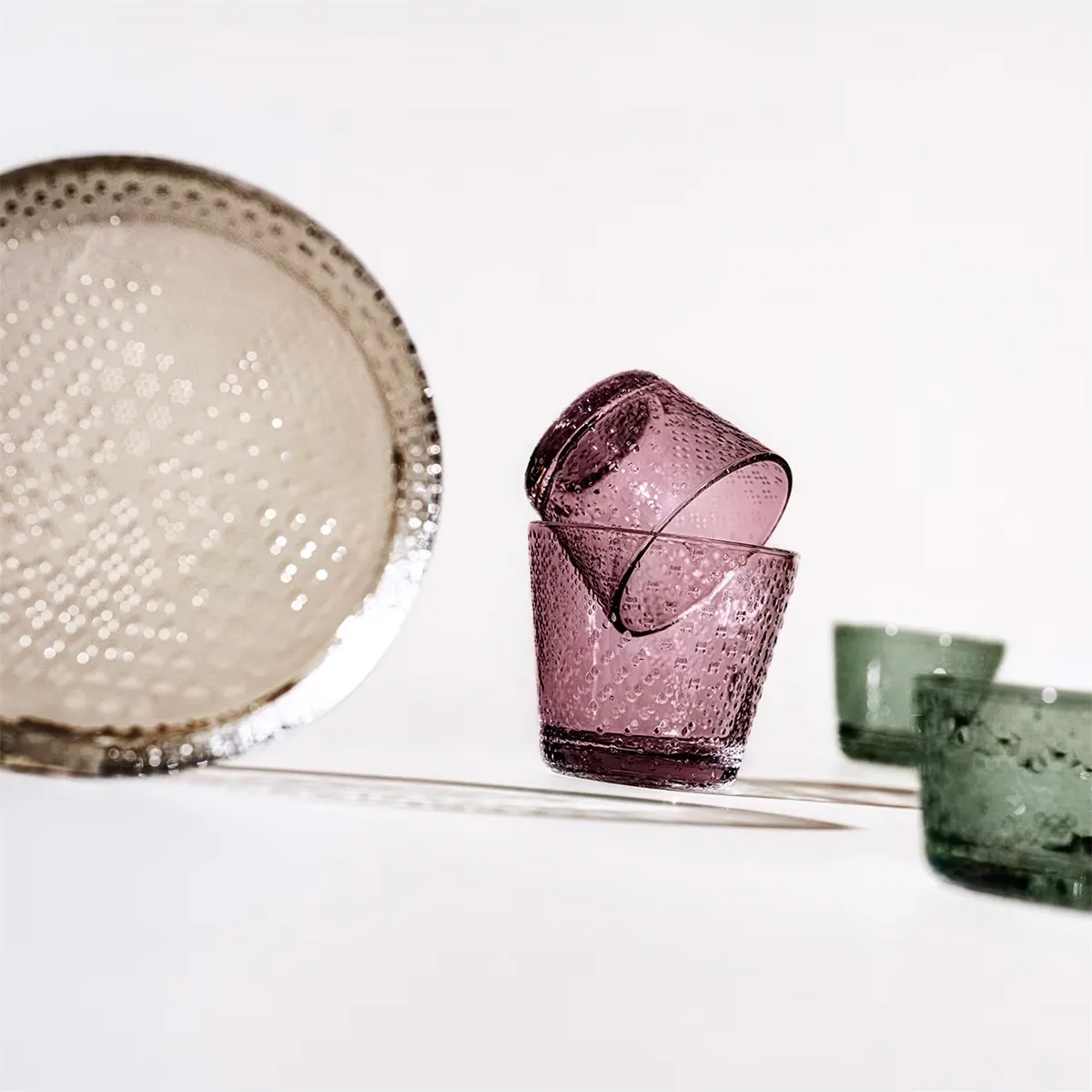 New additions to the Tundra collection designed by Oiva Toikka for Iittala featuring distinctive Nordic glass design