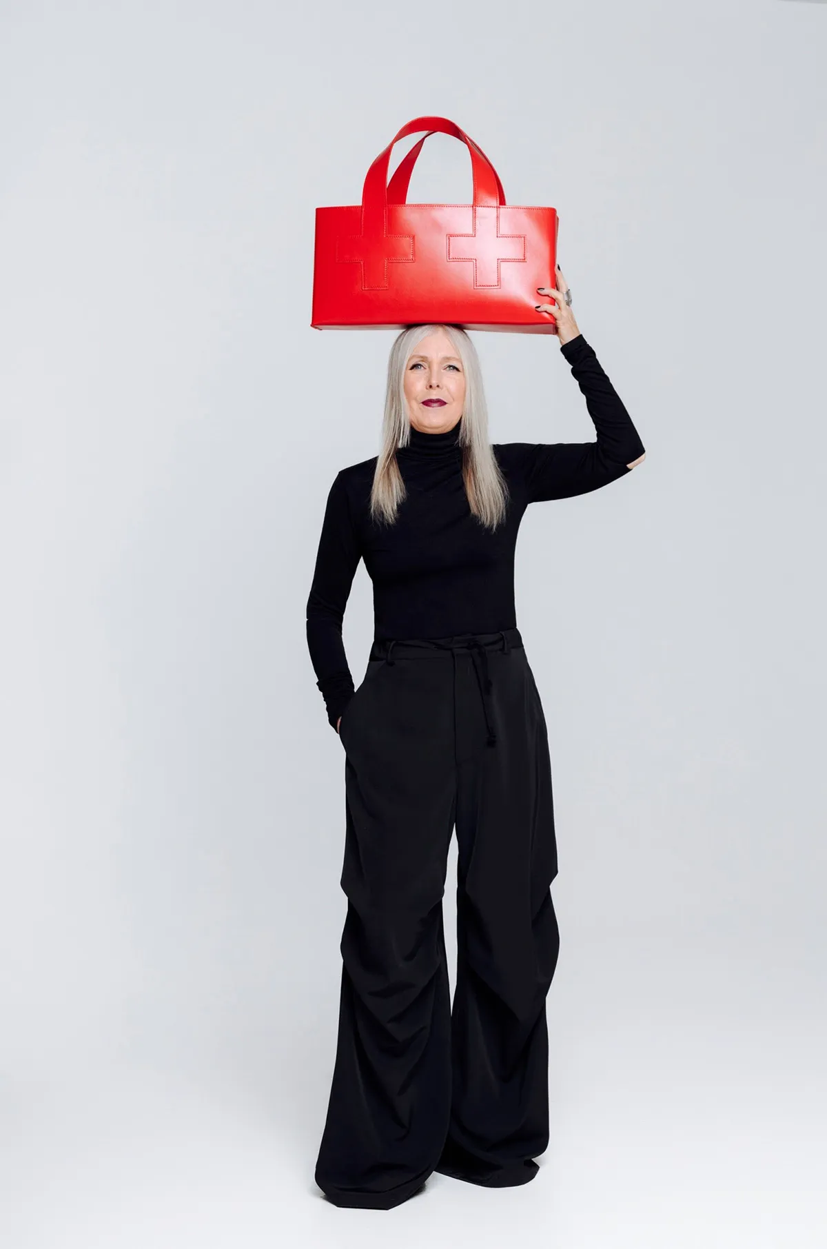 First Aid Bag by Pia Wallén for NK Tärnsjö Garveri collection in vegetable-tanned leather with distinctive cross symbol