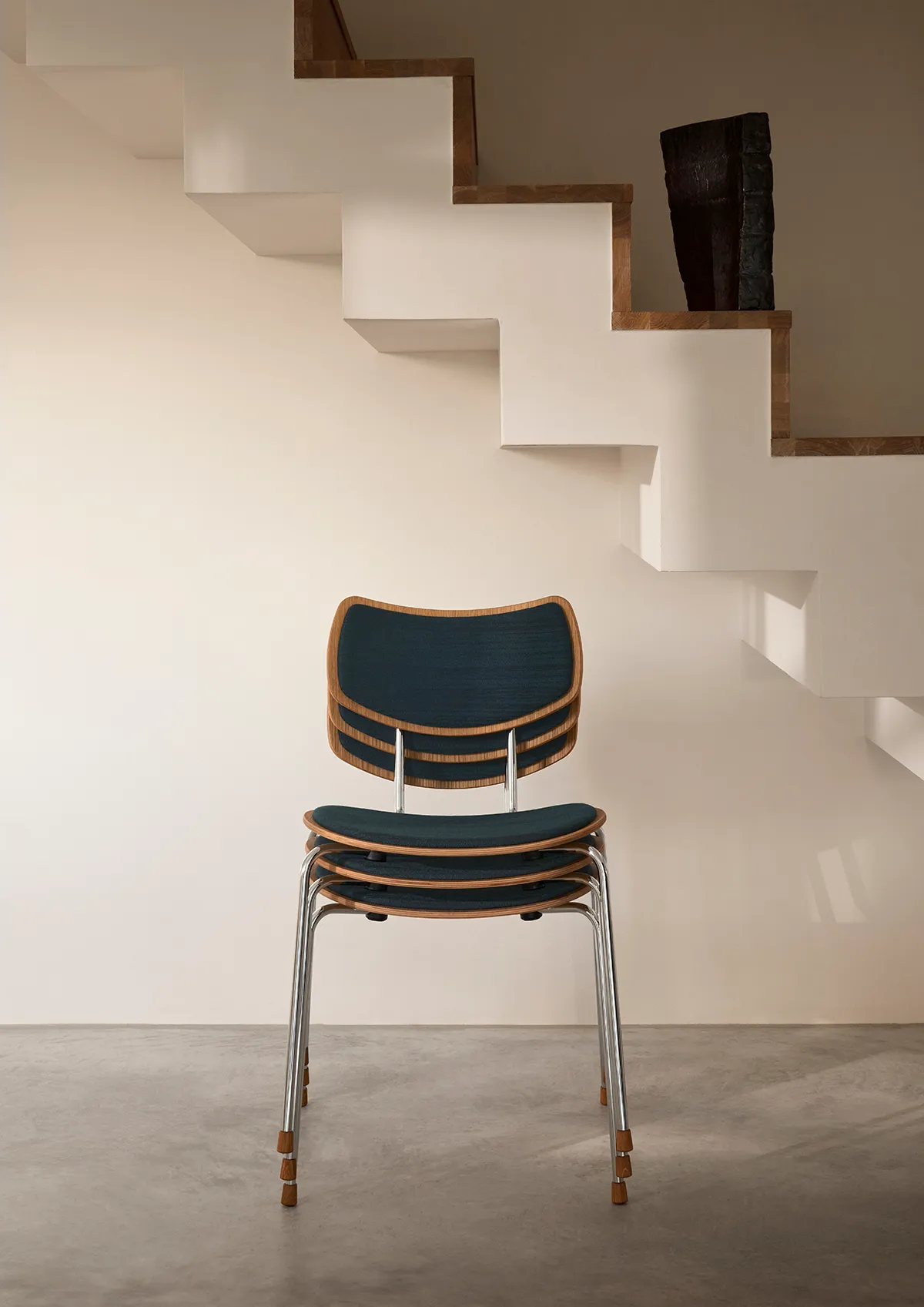 Vilhelm Lauritzen's distinctive VLA26 Vega design with new chrome finish from Carl Hansen & Søn