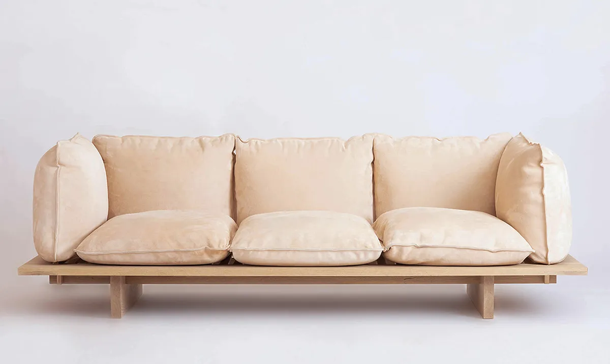 Innovative sofa design by Verk Projects featuring unique cushions suspended over sturdy glulam construction
