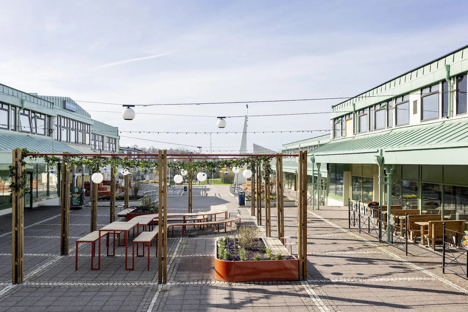 Sweden's first safety-certified public square featuring Nola's innovative Långbordet outdoor furniture