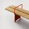 Close-up of Briskeby bench's new armrest connection showing Vestre's weather-resistant materials and engineering.