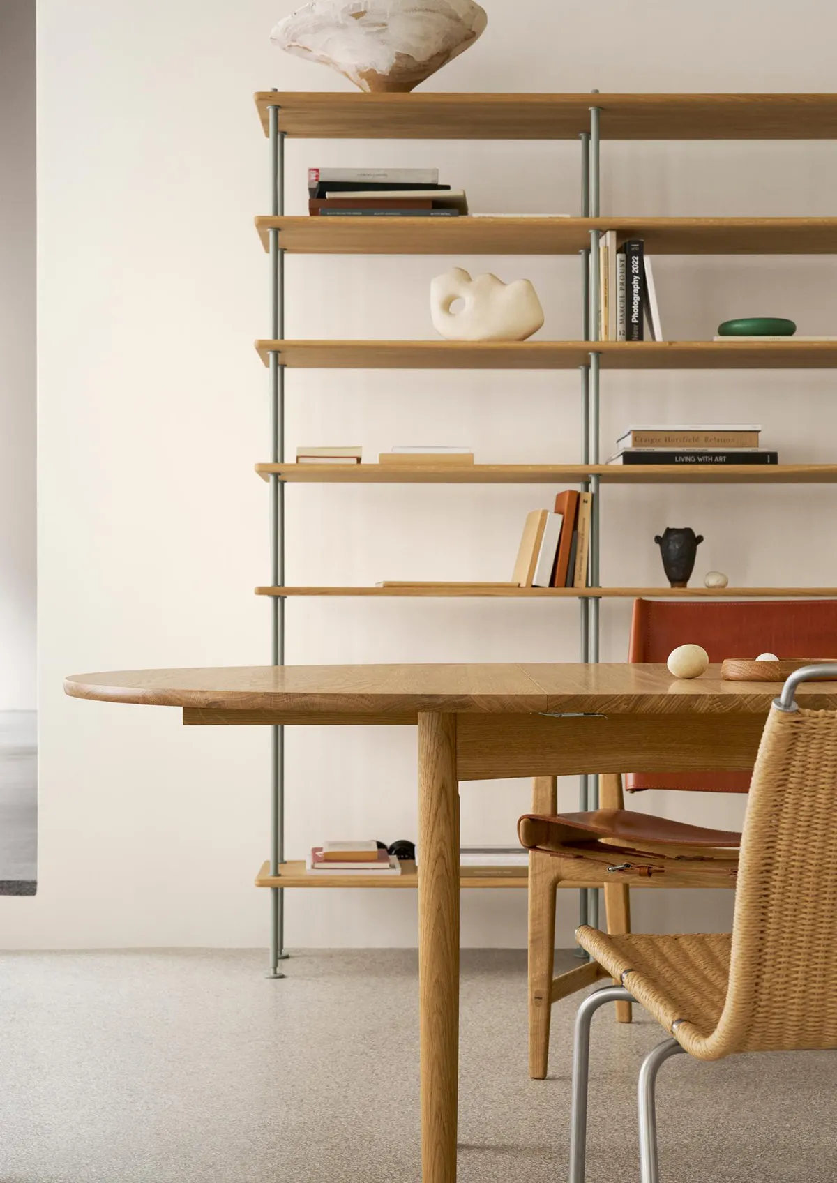 BM0121 coffee table with surrounding seating demonstrating its role as gathering point in contemporary living space