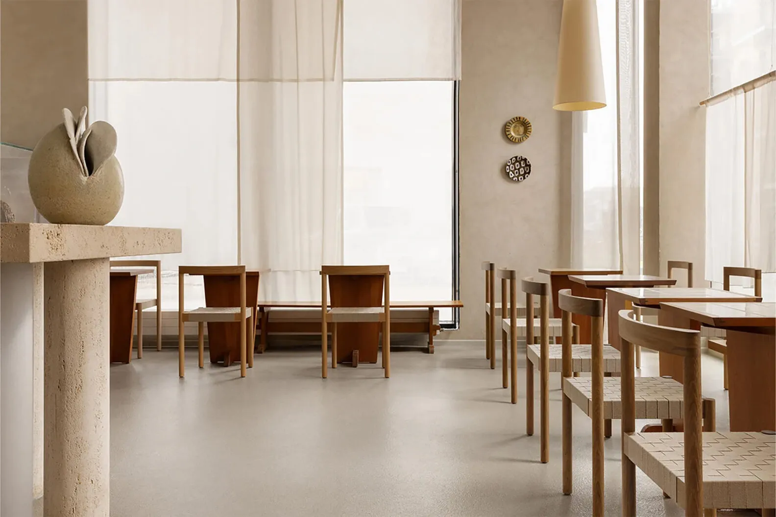 EKKO chair in architectural setting demonstrating its harmonious relationship with spatial design principles