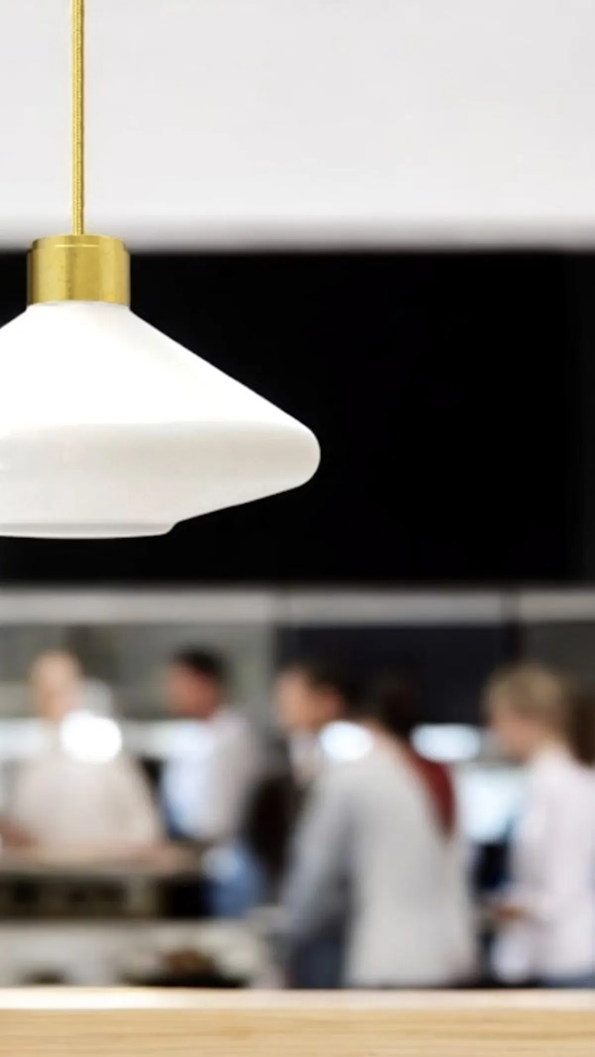 VOLVER lighting by Daniel Lavonius Jarefeldt for Örsjö featuring symmetrical design elements with elegant proportions