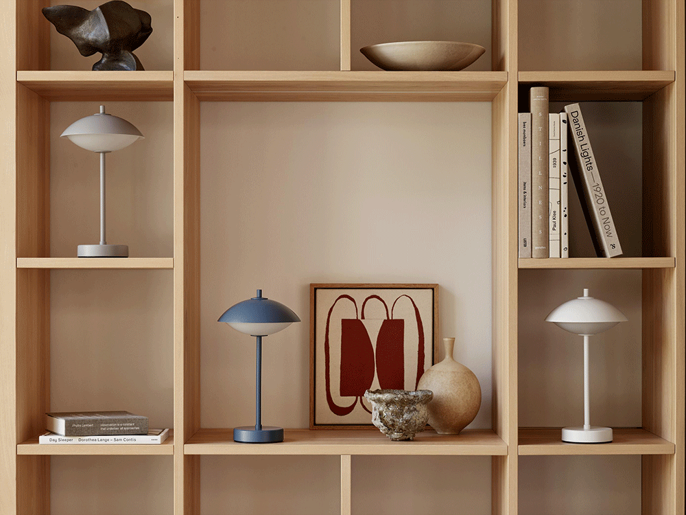 CLAM portable lamp by Ahm & Lund for Fritz Hansen featuring rechargeable battery and distinctive shell-inspired design