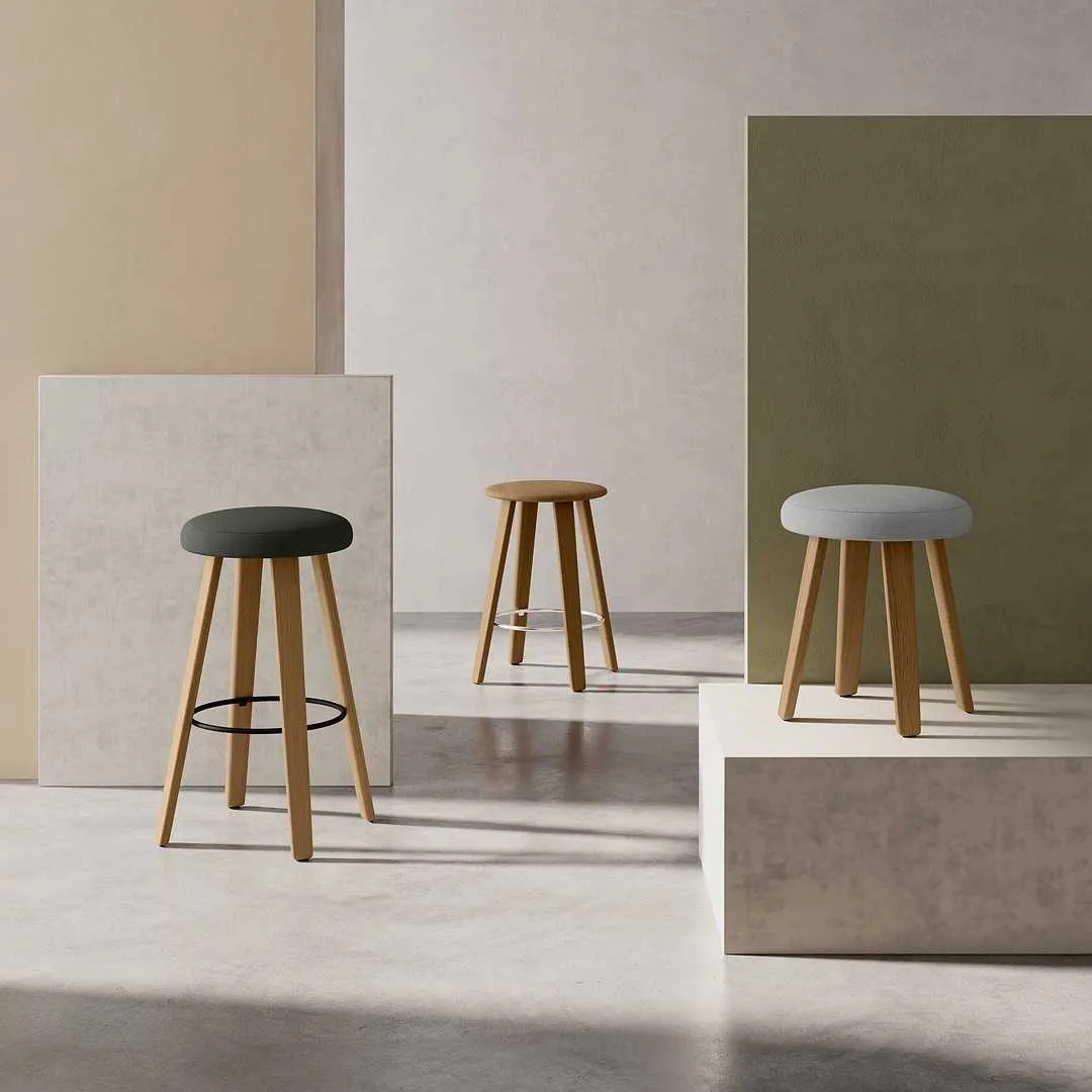 OONA stools by Antti Kotilainen for Martela featuring sympathetic design with organic curves and functional versatility
