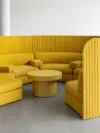 Focus Spaces modular sofa in open office setting, creating private meeting nooks within collaborative workspace