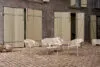 Vipp Lagrasse outdoor furniture arranged as a complete lounge set, demonstrating the collection's flexibility for small spaces