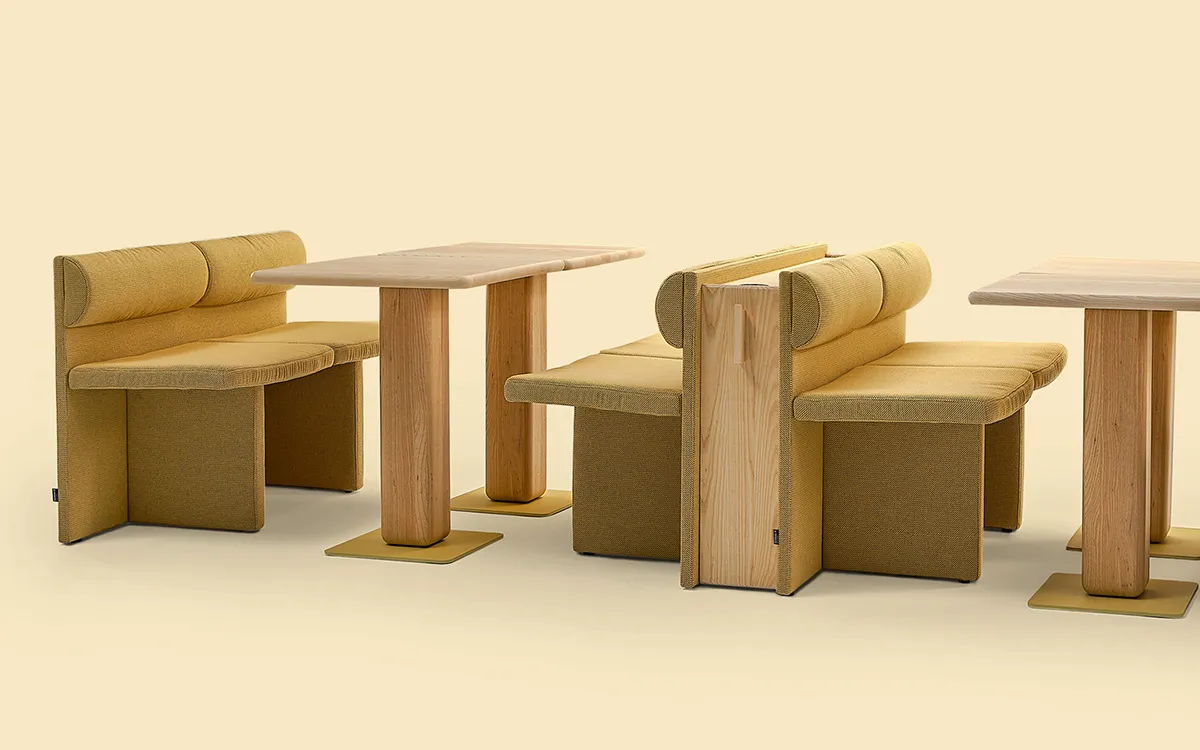 Cita collection by Note Design Studio featuring modular benches, tables and chairs for versatile meeting spaces.