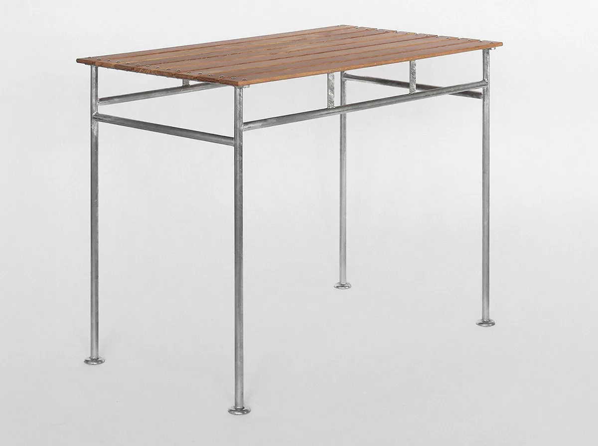 Stockholm Table outdoor furniture with characteristic bowl-shaped feet and linseed-oiled European oak top