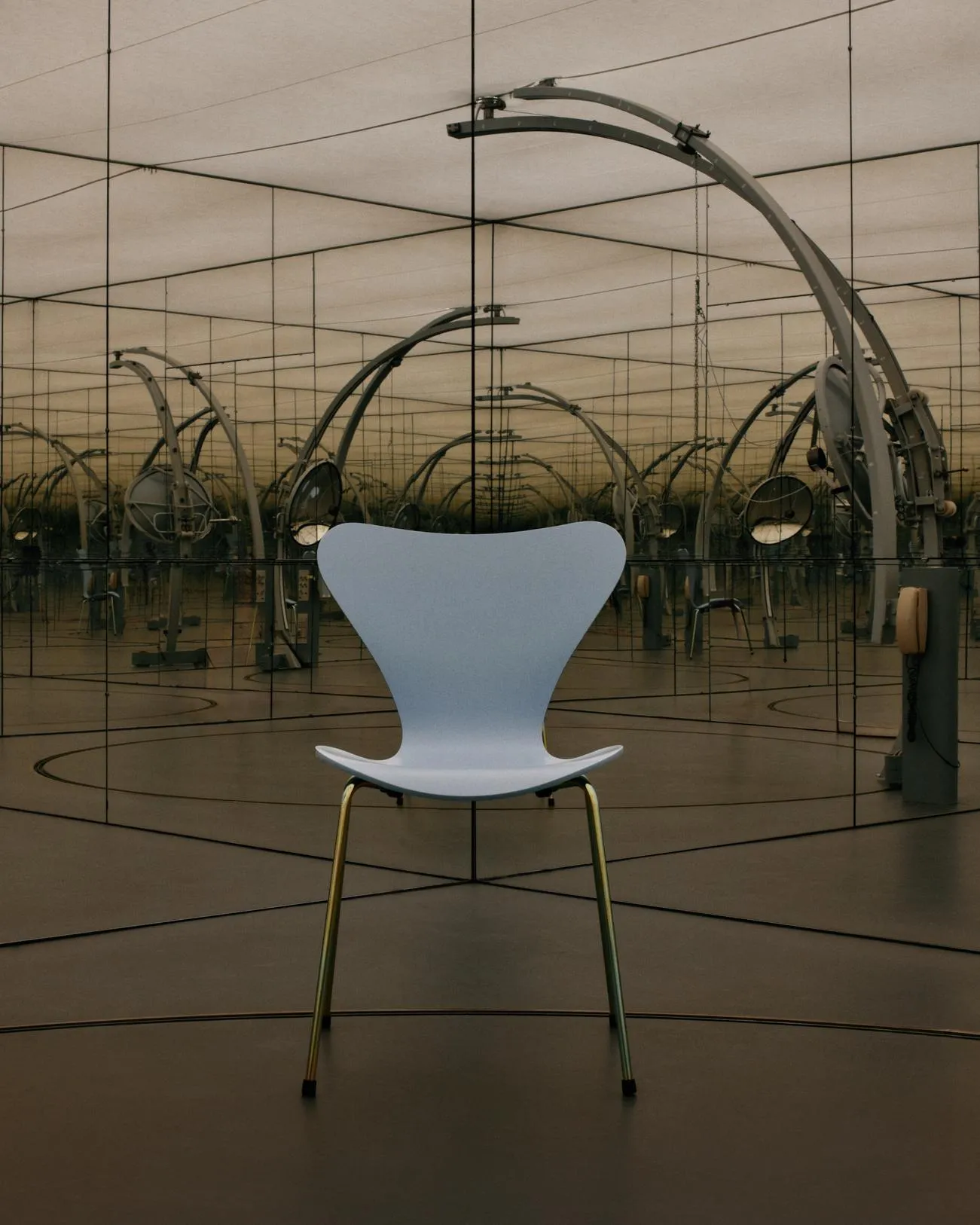 Blue Series 7 chair from Fritz Hansen's Morning Light collection arranged in a modern workspace setting