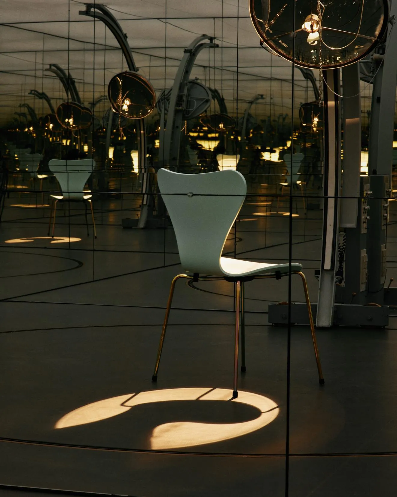 Fritz Hansen's limited edition Series 7 chair in beige with rainbow base styled in a contemporary Nordic dining area