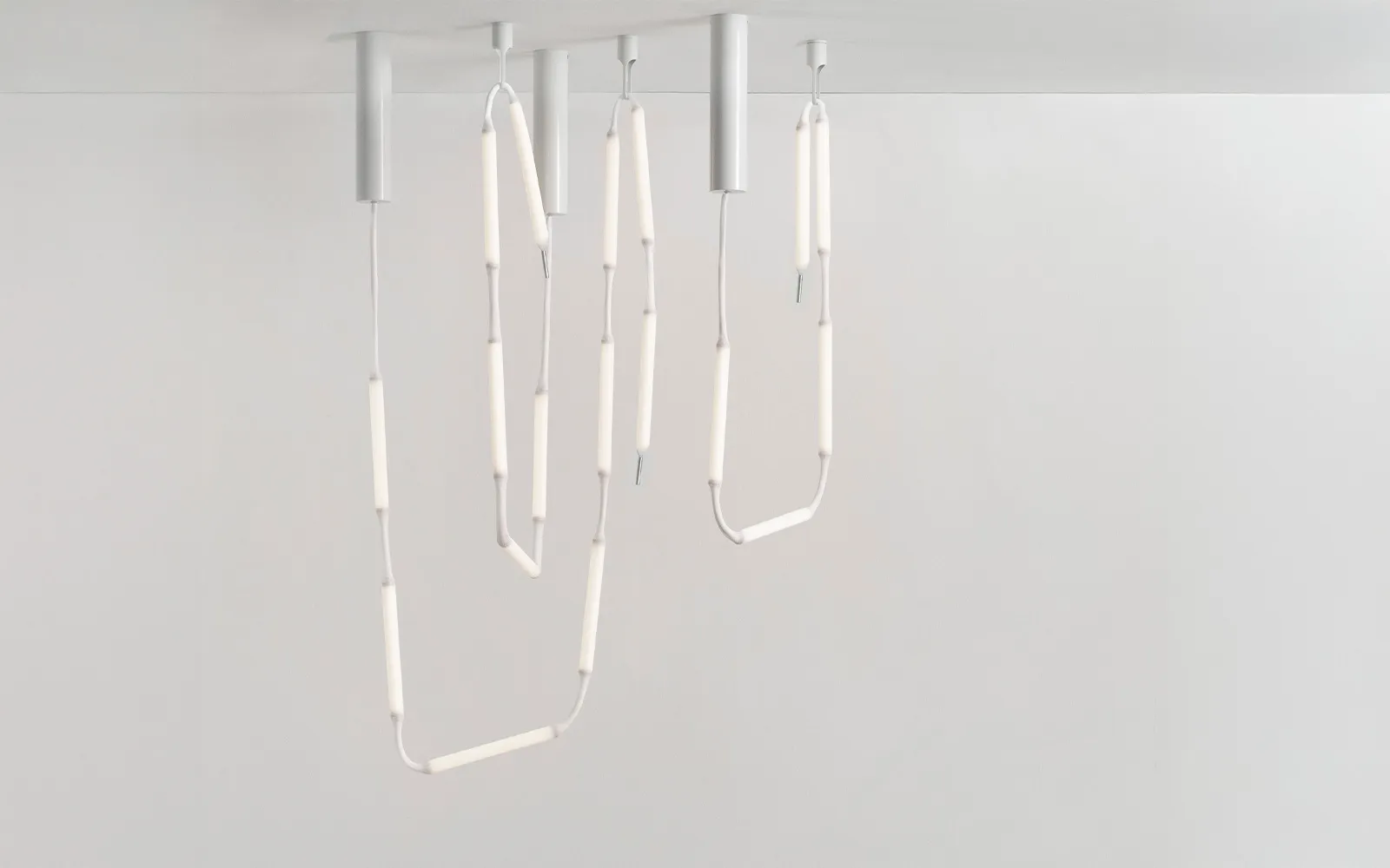 Side profile of Normann Copenhagen's Reb Lamp showing the linear arrangement of light modules designed by Verena Hennig of AKTTEM.