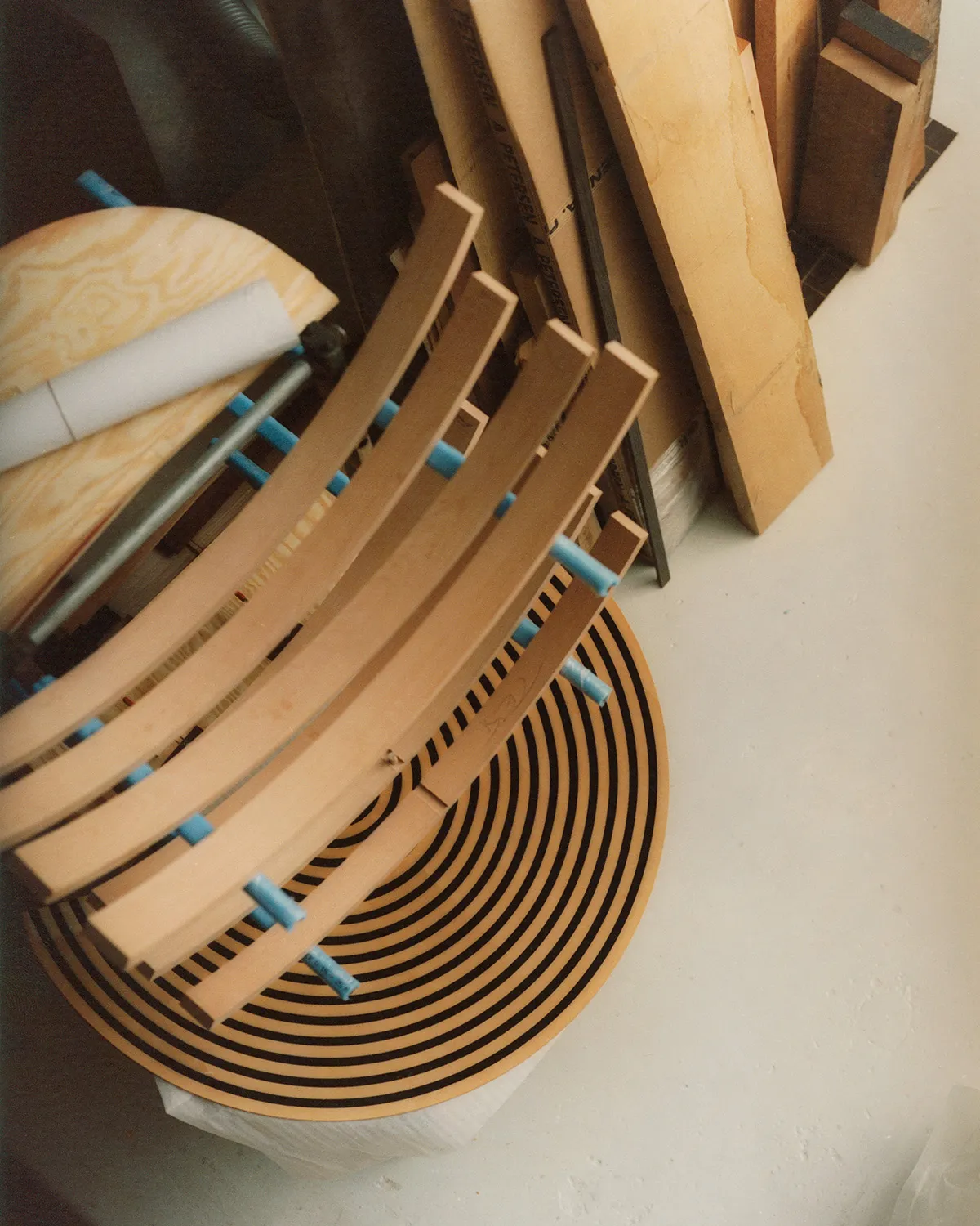 Danish workshop craftsmen assembling Nanna Ditzel bench using traditional woodworking techniques