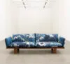 LK Hjelle Less sofa with Magne Furuholmen artistic textile in modern Norwegian living room setting