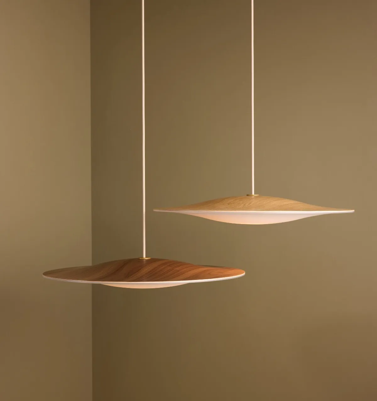 Sinus Wood pendant lamp by Piet Hein showcasing walnut finish and opal glass diffuser in modern interior