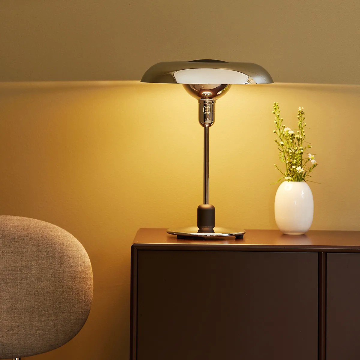 RA250 Anniversary chrome desk lamp illuminating modern workspace, showcasing optimal anti-dazzle lighting