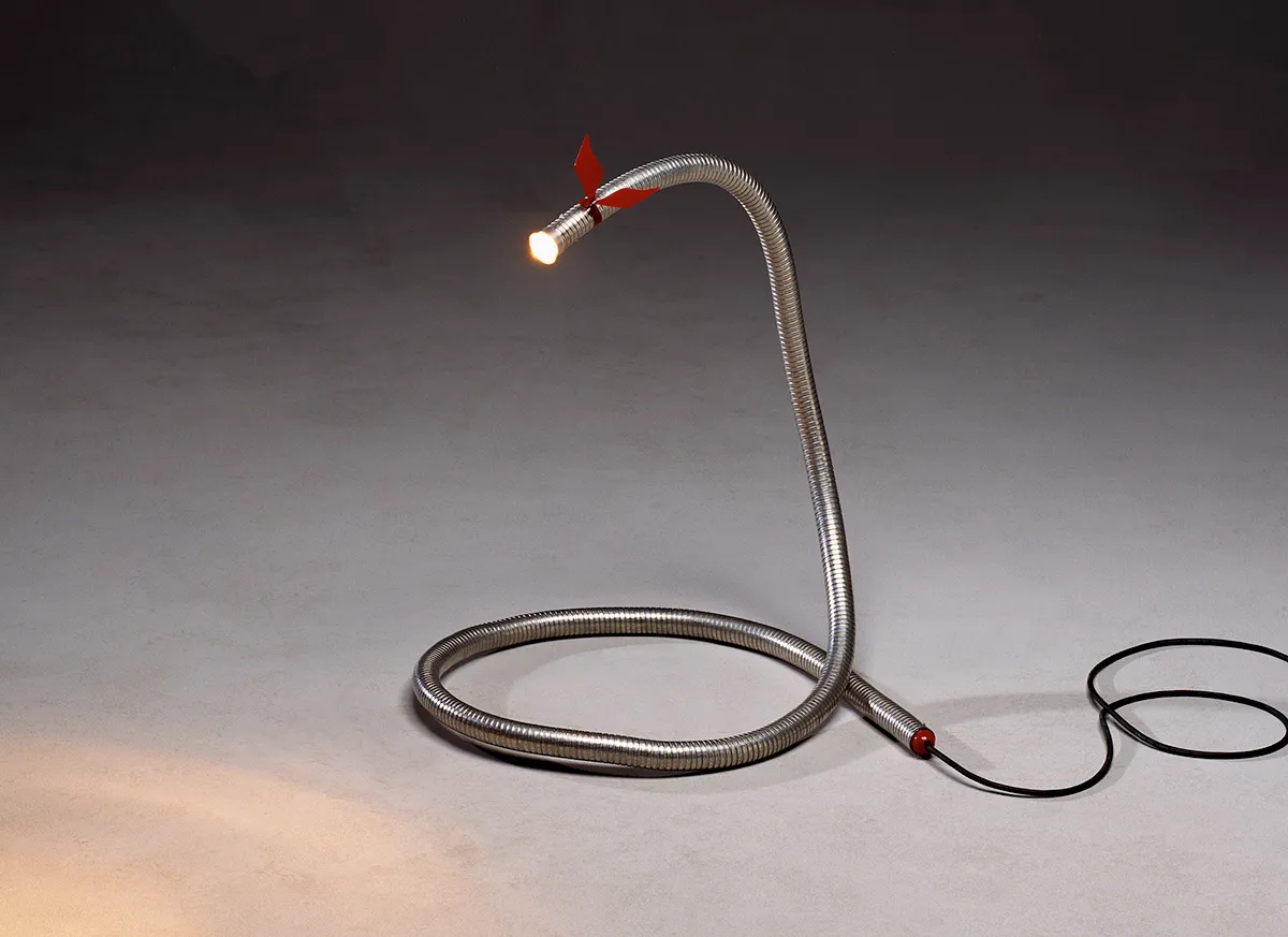 Draken lamp illuminated serpentine shape lighting effect Sigurdur Gústafsson atmospheric design