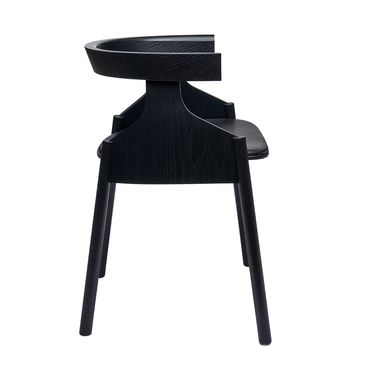 Side profile of Howdoyoudo chair by Björn Dahlström displaying ergonomic design and sculptural silhouette