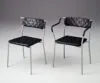 Mattias Ljunggren Chair & Armchair collection in steel and leather for Källemo 2001 showing complete furniture series