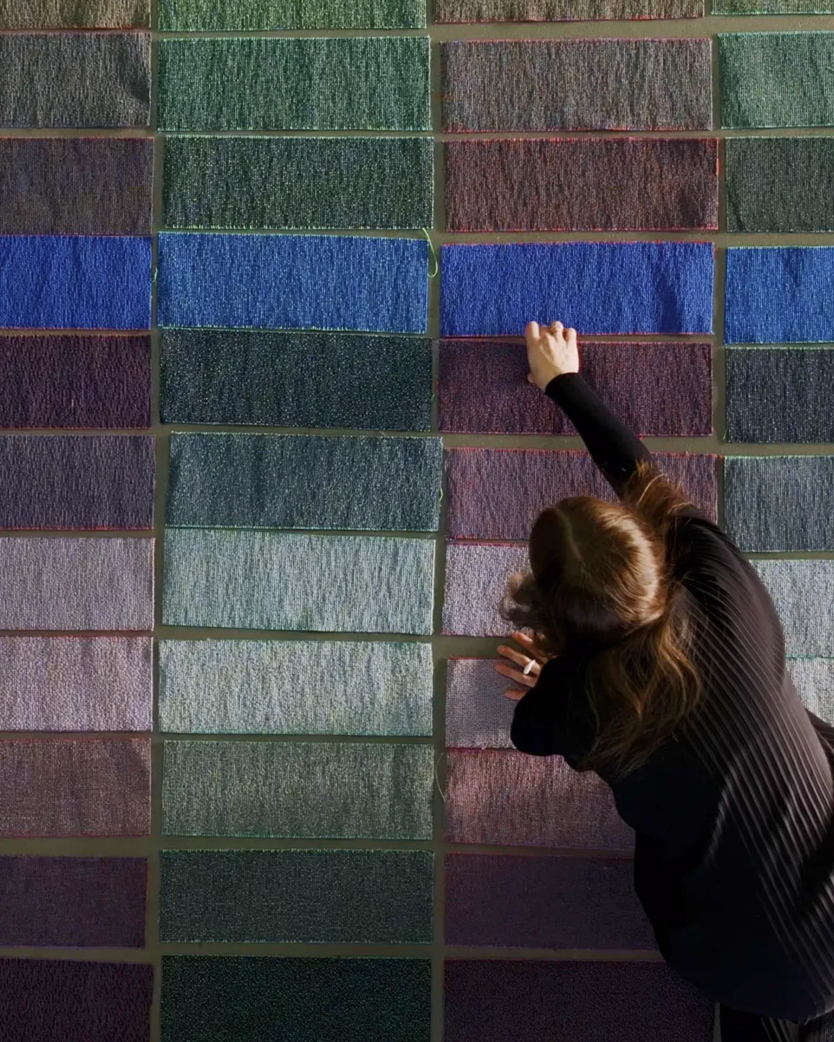 MATTER carpet collection overview by Snøhetta and Ege Carpets showing digital randomness pattern in studio lighting