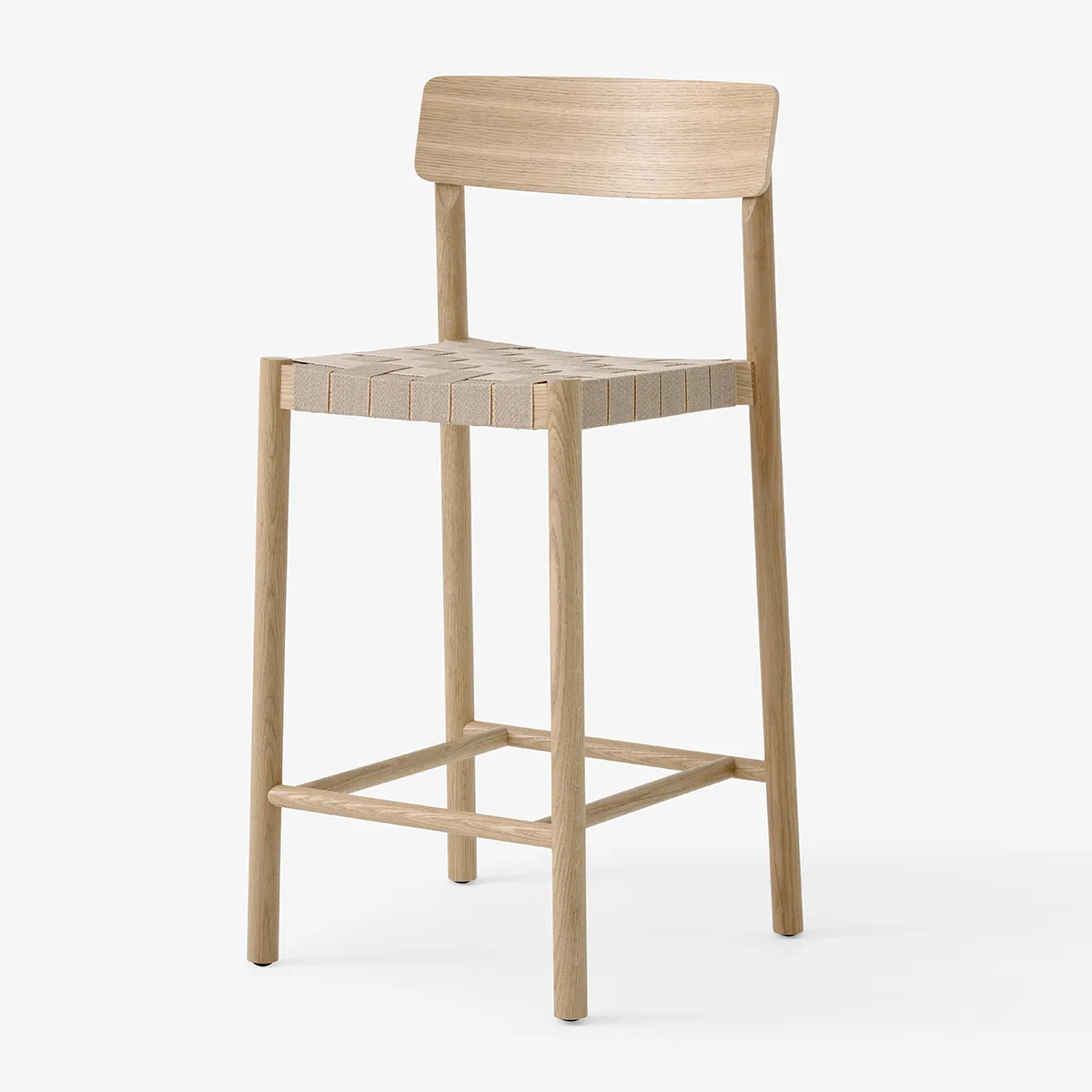 Side profile Betty counter chair displaying ergonomic backrest and elevated seating design