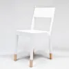 TS Chair by Thomas Sandell for Asplund featuring distinctive white finish with natural wood leg detail