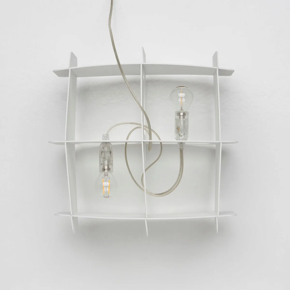 Ristikko pendant lamp isolated showing geometric birch plywood lattice design and warm lighting