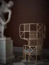 Matti Klenell NM& 040 rattan chair showing transparent patchwork backrest design by Larsson Korgmakare Stockholm