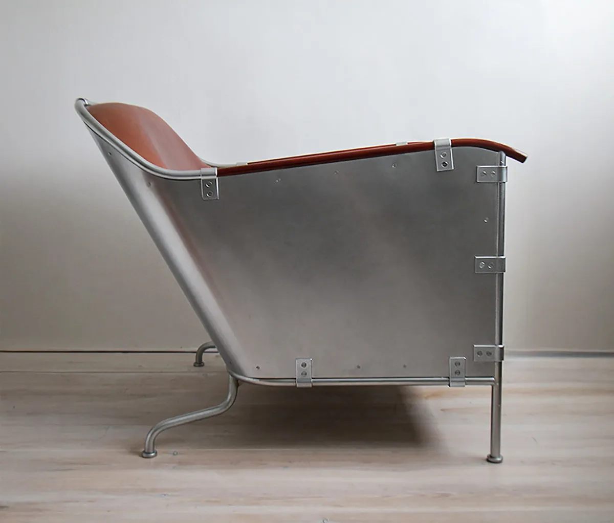 The Rex armchair exemplifies Mats Theselius's ability to unite industrial materials with sculptural form. Only 200 pieces were made in 1995.