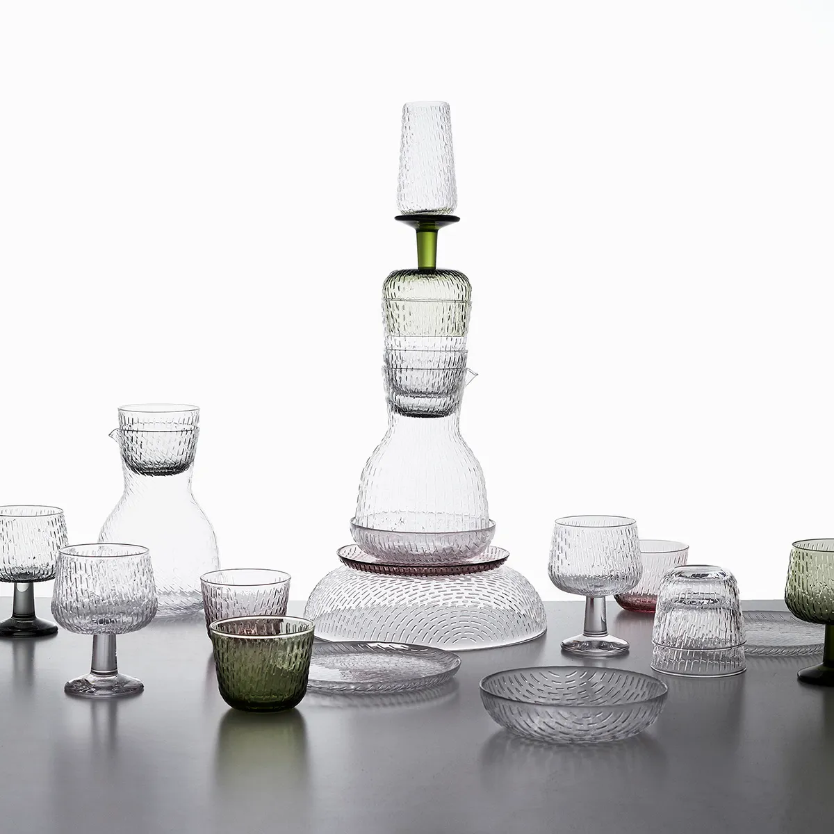 Marimekko Syksy glassware collection by Matti Klenell displaying autumn-inspired patterned surfaces