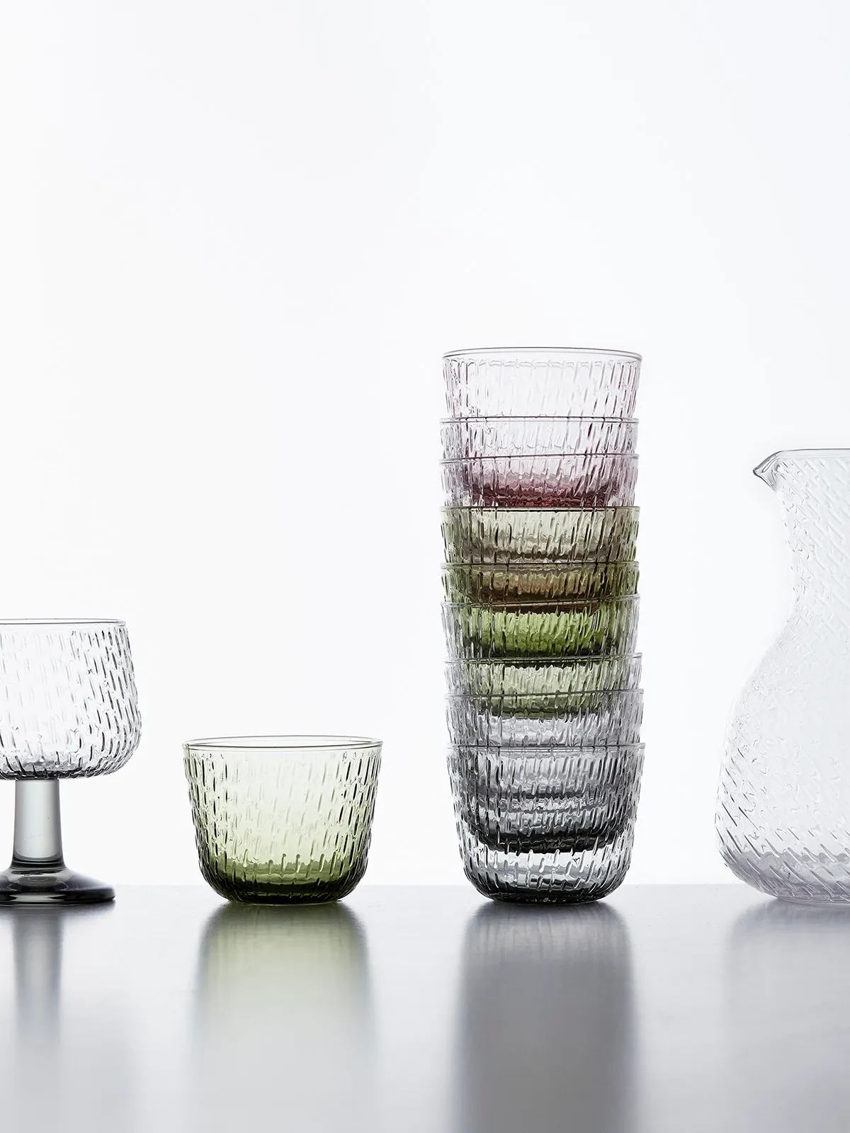 Close-up of Syksy glass pattern showing rain-like texture design by Matti Klenell for Marimekko