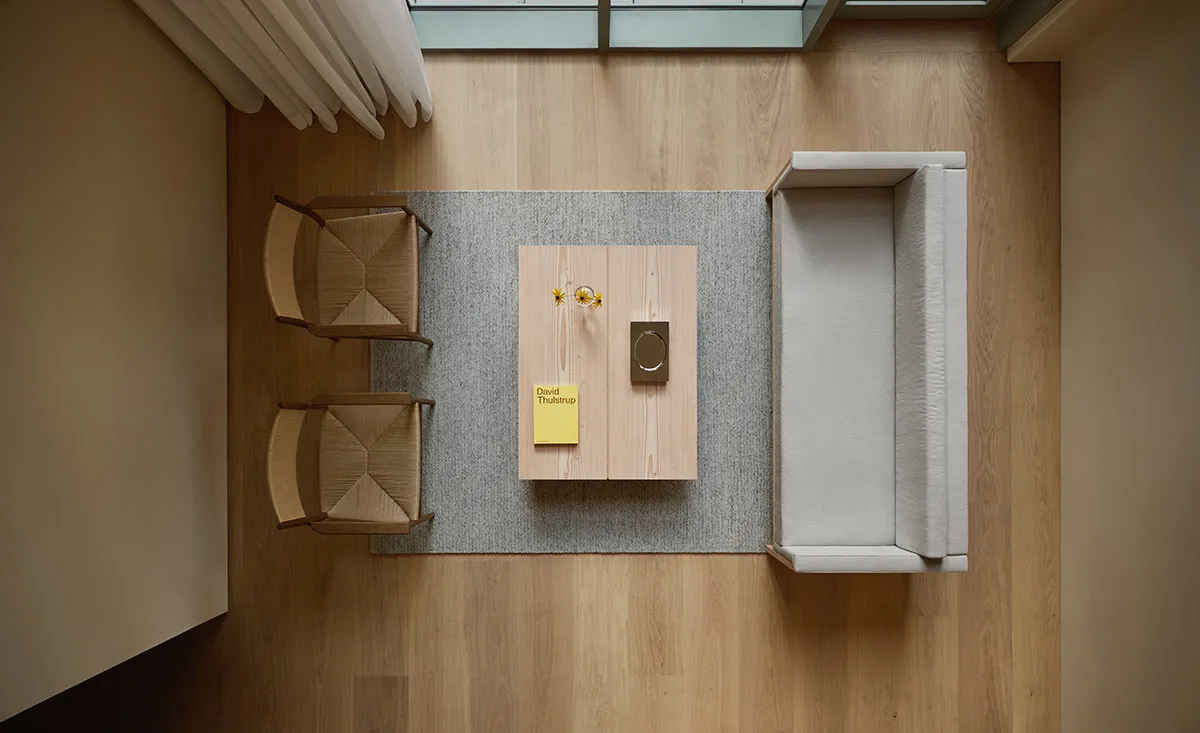 David Thulstrup Danish architect designer standing in Dinesen Apartment Brooklyn New York