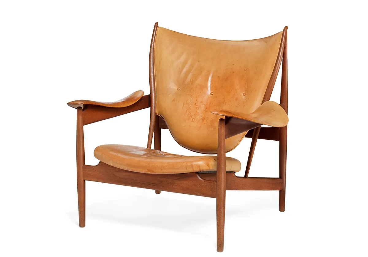 Close-up of teak armrest detail on Finn Juhl Chieftain Chair showing craftsmanship by master cabinetmaker Niels Vodder