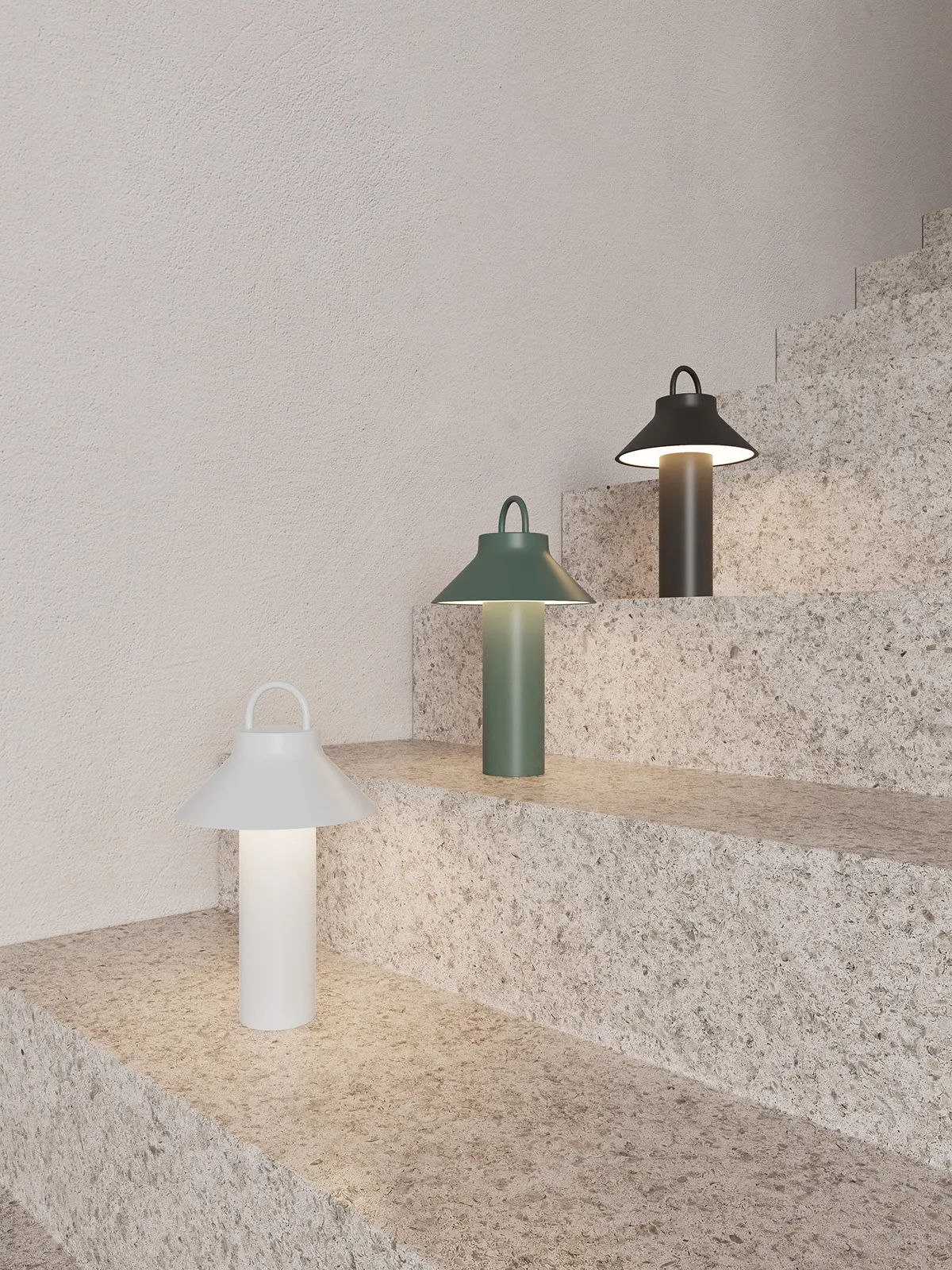 Moov portable LED lamp by Johannes Lindner for Novoform with cylindrical metal body and wide angled shade