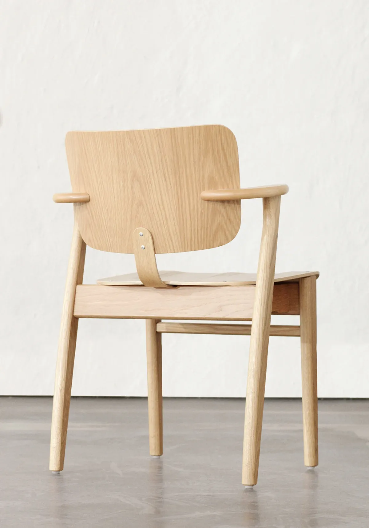 Domus Chair by Ilmari Tapiovaara for Artek — moulded plywood seat and characteristic short armrests
